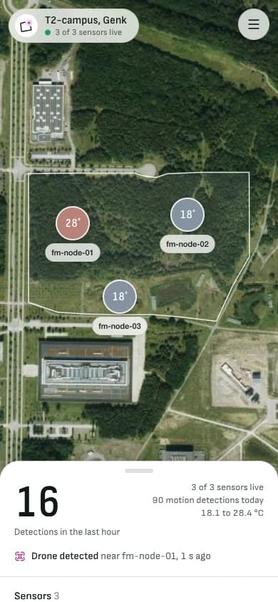 The FieldMesh live view on a phone: the sensor field on a satellite map, 16 detections in the last hour, and the latest one: drone detected near fm-node-01.